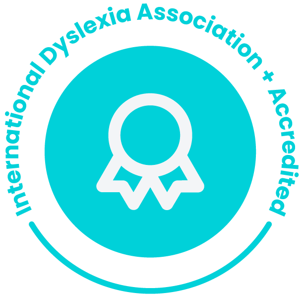 Graphic of award ribbon with text reading "International Dyslexia Association + Accredited"