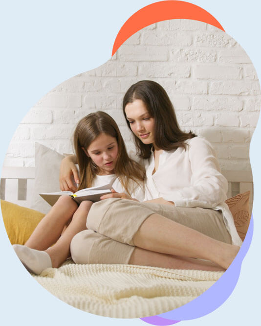 mom and daughter reading a book